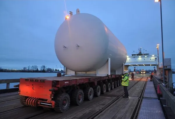 Large vessel being loaded onto barge at Delta BC