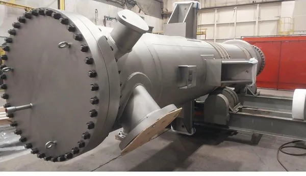 Shell and tube exchanger 304SS on lathe at Axton
